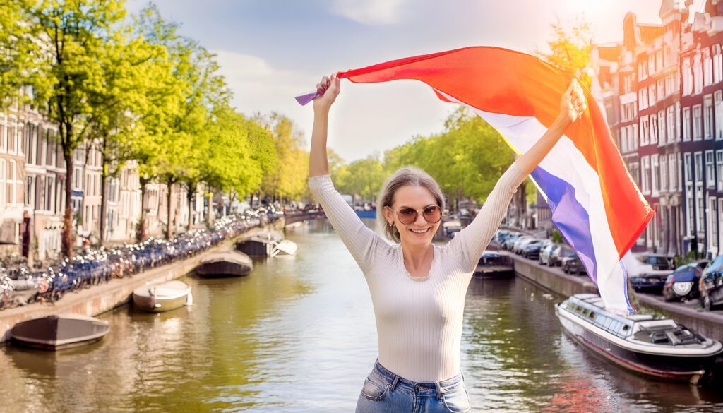 Femme qui milite pour ses droits avec un drapeau des Pays-Bas à Amsterdam